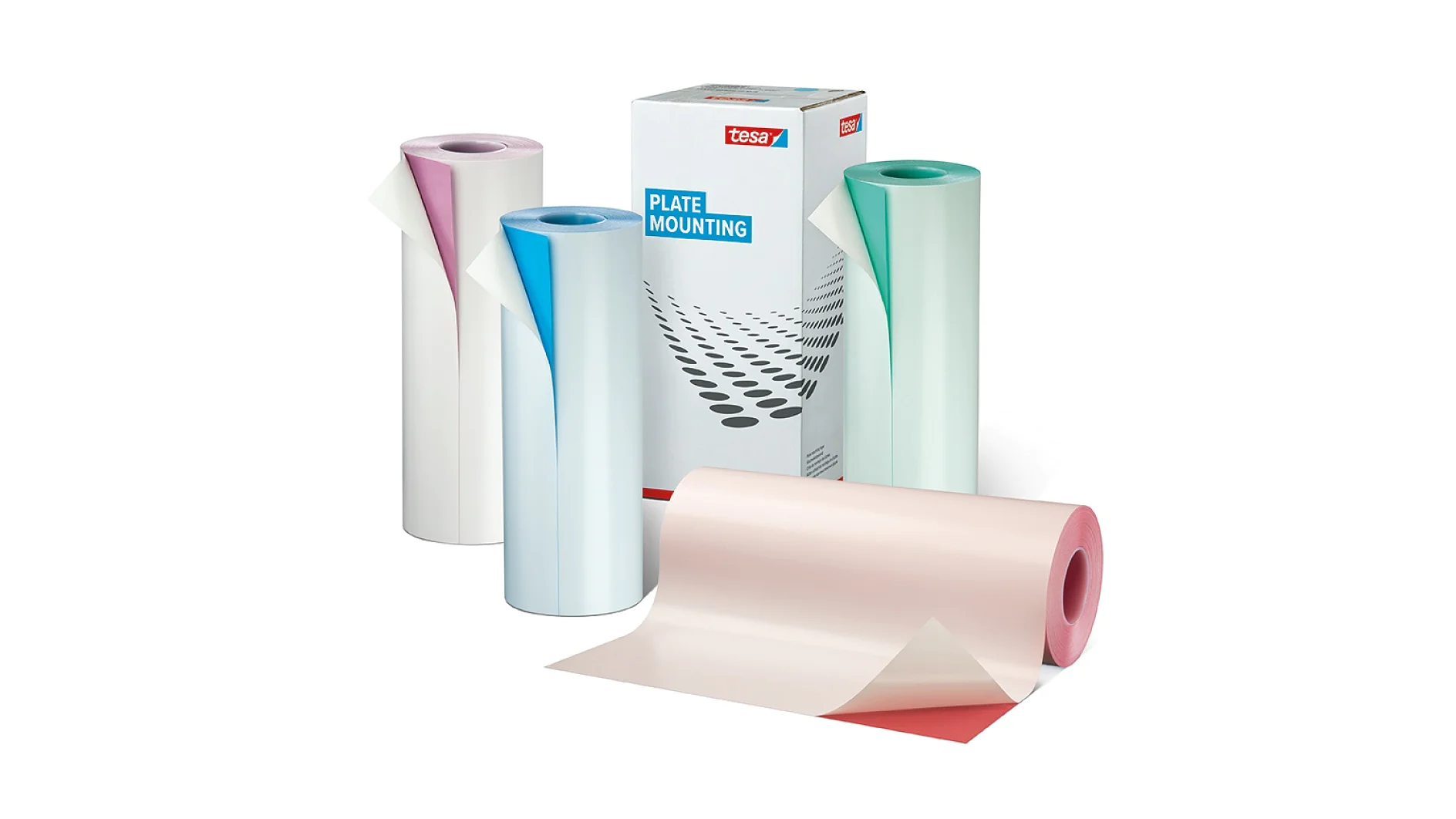 Four rolls of tesa tape in pink, blue, green, and purple are displayed, with some rolls partially unrolled. A box labeled Plate Mounting by tesa is positioned behind the rolls. (This text has been generated by AI)